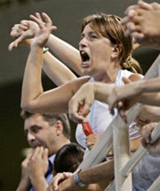 Fans at the Olympic Indoor Hall loudly protest the score given Russian gymnast Alexei Nemov for his high bar routine during the men's gymnastics individual apparatus finals at the 2004 Summer Olympic Games in Athens, Monday, Aug. 23, 2004. Nemov finished fifth in the competition.
